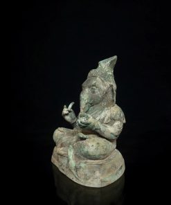 a statue of a person smoking a pipe
