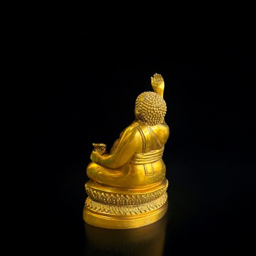 a gold statue of a person holding a musical instrumentThánh tăng tài lộc bằng đồng