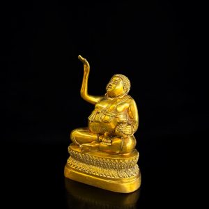 a gold statue of a man