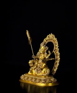 a gold statue of a person holding a spear