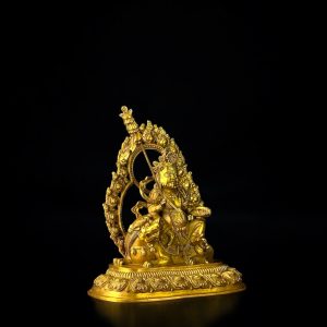 a gold statue of a god