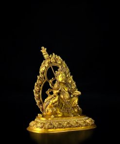 a gold statue of a person holding a spear