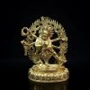 a gold statue of a man