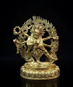 a gold statue of a man