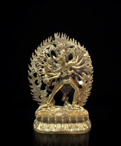 a gold statue of a man with arms and legs