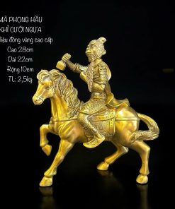 a gold statue of a man riding a horse