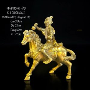 a gold statue of a man riding a horse