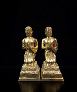 a pair of gold statues